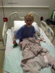 Settled in her room.  She has an IV on her left arm, covered with a washcloth that